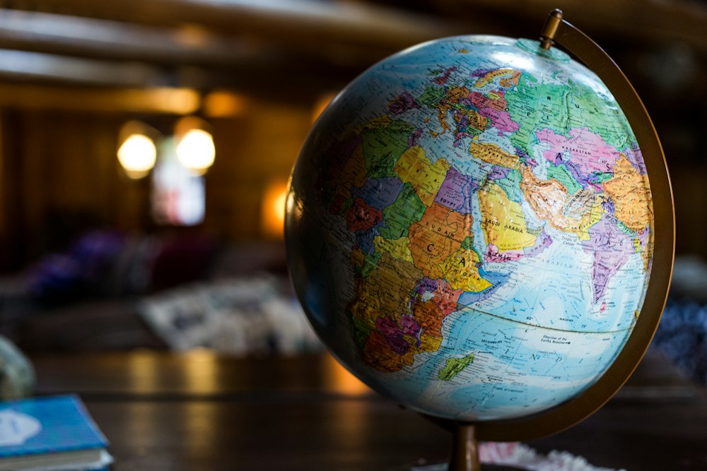 World map with pins and routes